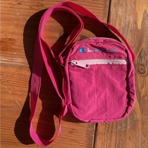 Pink Champion adjustable cross body bag.